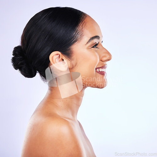 Image of Skincare, profile and happy Indian woman in studio for body care, cosmetics and results on white background. Side, beauty and female wellness model smile for luxury dermatology, treatment or routine