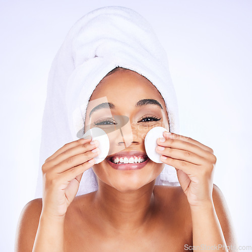 Image of Skincare, cotton and woman portrait in studio for makeup removal, toner or hydration on white background. Smile, beauty and face of female model with facial pad for cleaning, glowing skin or wellness