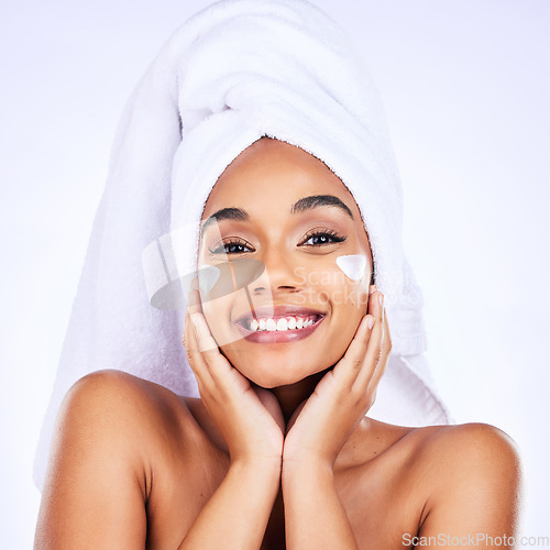 Image of Skincare, face cream and happy woman in studio with cosmetic, wellness and application on grey background. Facial, portrait and female model with sunscreen, lotion or mask, spf or glowing skin