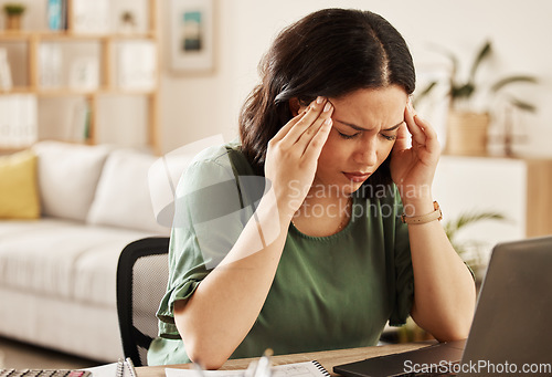 Image of Woman, burnout and headache with laptop and remote work stress at a desk feeling frustrated. House, female person and confused from computer problem with learning anxiety from online website project