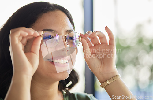 Image of Woman, glasses and thinking with eyes, optometry and health with smile, choice and fashion in store. Girl, frame and lens for wellness, vision and happy for eyesight, decision and customer experience