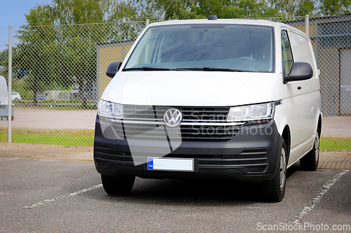 Image of White Volkswagen Multivan T6 Parked on a Yard