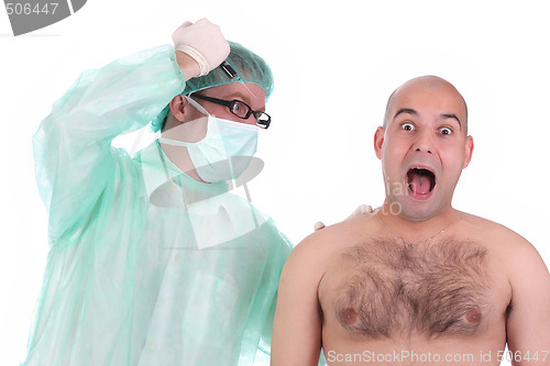 Image of surgeon injecting a scare patient 