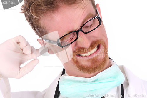 Image of doctor scratching