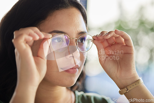 Image of Woman, glasses and thinking with eyes, optometry and health with ideas, choice and fashion in store. Girl, frame and lens for wellness, vision and test for eyesight, decision and customer experience