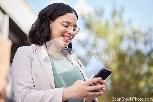 Image of Outdoor, business woman and reading a cellphone for work or communication on website for networking. Typing, technology and app with professional female in city for information or social media.