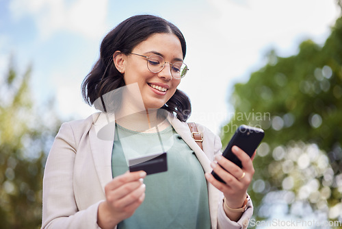 Image of Phone, credit card and woman in city for online shopping, easy business payment and fintech or e commerce in park. Mobile, debit and professional person for web 3.0 finance, outdoor travel or banking