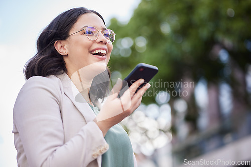 Image of Phone, voice recording and businesswoman in the city on a loudspeaker call walking in the street. Technology, happy and professional female person on mobile conversation while commuting in urban town