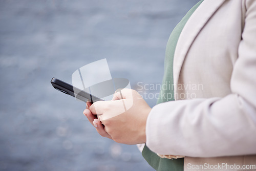 Image of Hands, phone and a person outdoor with communication, internet connection and mobile app. Closeup of a business woman, urban town and a smartphone while typing a message or chat on social media
