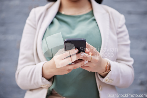 Image of Phone, outdoor and woman hands for business communication, networking and social media. Professional chat, mobile search and person or worker reading information or opportunity on wall background