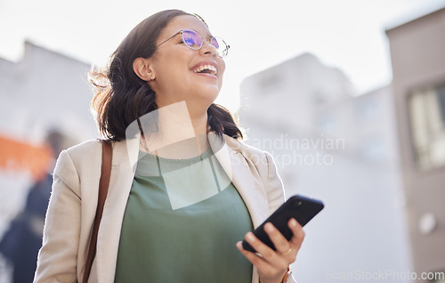 Image of Phone, walking and happy woman outdoor in a city with communication, internet connection and app. Laugh, professional person and urban road with smartphone for message, chat or social media on travel