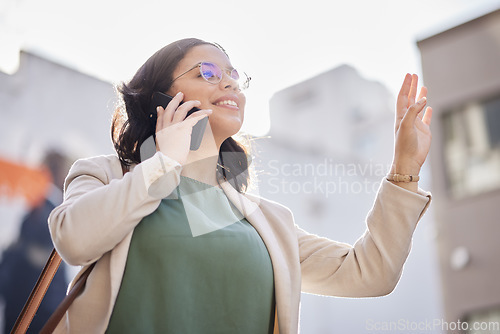 Image of Business, woman and wave for taxi and phone call, talking in the city and outdoor travel to office building on public transport. Happy, waving and person speaking on mobile and calling for a cab