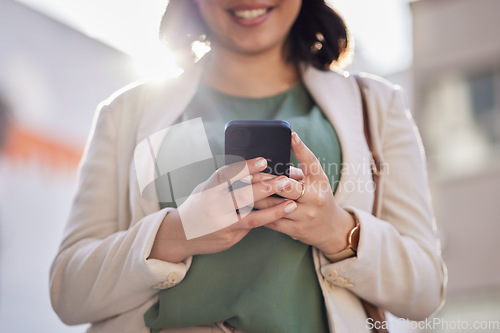 Image of Phone, hands and a woman outdoor in a city with communication, internet connection and app. Closeup of a business person, urban town and a smartphone while typing a message or chat on social media