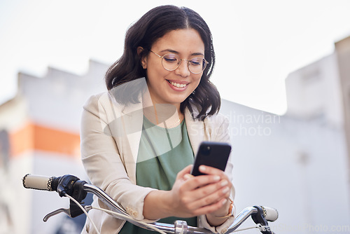 Image of Phone, bicycle and business woman in city for search, carbon footprint and communication. Mobile app, eco friendly and networking with female employee for contact, technology and social media