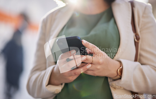 Image of Person, hands and a phone outdoor for communication, internet connection and mobile app. Closeup of a business woman, urban town and a smartphone while typing a message or chat on social media