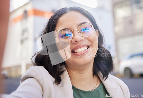 Image of Young business woman, selfie and city with smile, glasses and excited for start to finance career in street. Employee, outdoor and happy with memory, photography and profile picture for social media