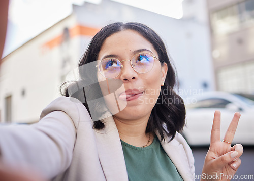 Image of Business woman, selfie and city with peace sign, funny face or glasses for meme, finance career or street. Employee, outdoor and comic icon for memory, photography or profile picture for social media