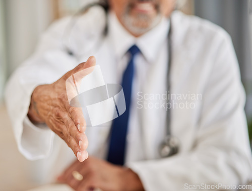 Image of Handshake, meeting and doctor or man for welcome, introduction and thank you in healthcare service. Medical professional person shaking hands in patient POV consultation, advice or support in office