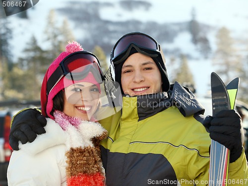 Image of Young couple at skiing resort