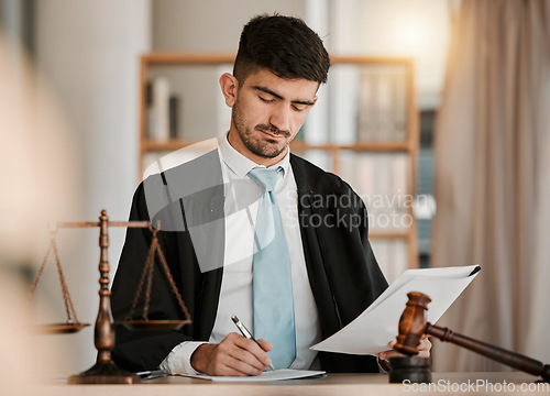 Image of Attorney man, scales and hammer with writing, documents and notes for reading, thinking and crime analysis. Advocate, lawyer or judge with legal research, paperwork and analytics for court evidence