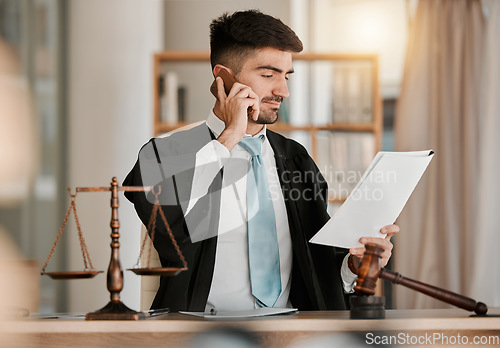 Image of Attorney man, scales and hammer with phone call, documents and reading with thinking for crime analysis. Advocate, lawyer or judge with legal research, paperwork and networking for court evidence