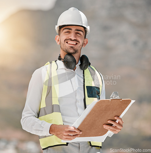 Image of Portrait, engineering and happy man at construction site with checklist for inspection, project management and architecture. Maintenance, contractor or builder with smile and clipboard for safety.