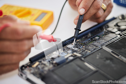 Image of Motherboard, hands and circuit board with microchip, engineering and repair closeup. IT, hardware and electrical person working on maintenance, problem solving and cpu check of battery with tools