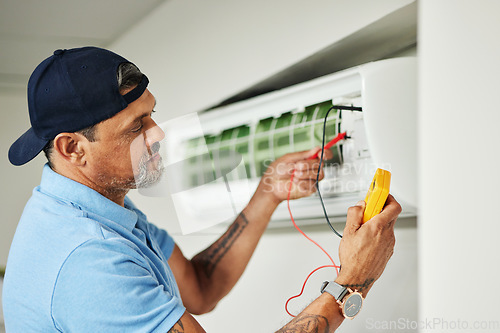 Image of Electrician, multimeter and test for power, electricity or energy inspection on electrical box, system and voltage tools. Technician, engineer or handyman to measure current, supply or maintenance