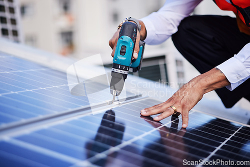 Image of Solar panels, person hands and tools for engineering maintenance, electrical repair and rooftop contractor, Grid, drill and industrial worker or electrician for eco photovoltaic installation in city