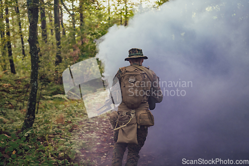 Image of Battle of the military in the war. Military troops in the smoke