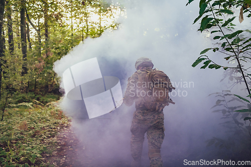 Image of Battle of the military in the war. Military troops in the smoke