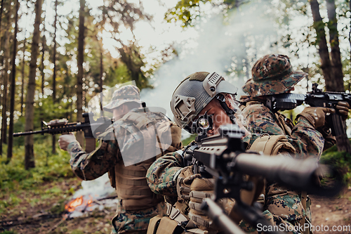 Image of Modern Warfare Soldiers Squad Running in Tactical Battle Formation Woman as a Team Leader