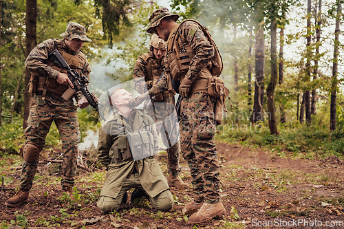 Image of Soldiers squad was capture alive terrorist and interrogation them on them on special tactics violent way