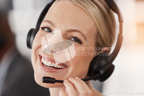 Image of Call center, face of happy woman or portrait of telemarketing agent with microphone for customer service, CRM support and FAQ contact. Female sales consultant smile for telecom questions at help desk