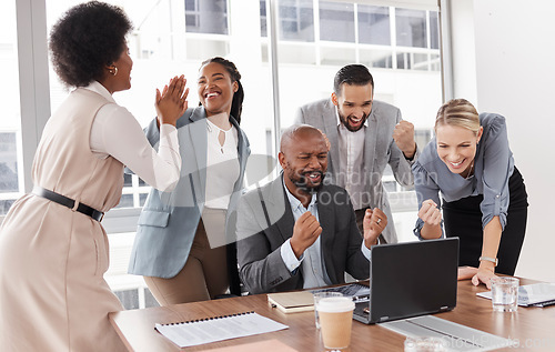 Image of Business people, staff and achievement with a laptop, celebration, excited or happiness with a new project. Teamwork, group or coworkers with pc, success or goals with growth, target or collaboration