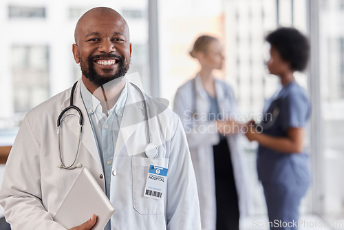 Image of Smile, portrait and hospital doctor, black man or cardiologist team leader of healthcare trust, medical wellness and cardiology. Group leadership, tablet and African person for professional support