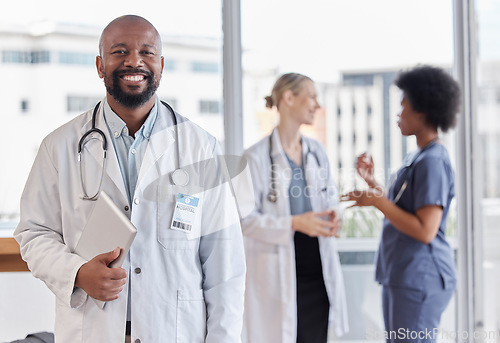 Image of Happy, portrait and hospital doctor, black man or surgeon team leader smile for healthcare, medical services and clinic help. Medicine expert, tablet and African person for cardiology health support