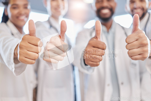 Image of Thumbs up, hands and hospital doctors, happy people or surgeon team healthcare vote, medical feedback or health agreement. Teamwork support, emoji like icon and wellness clinic group with yes gesture