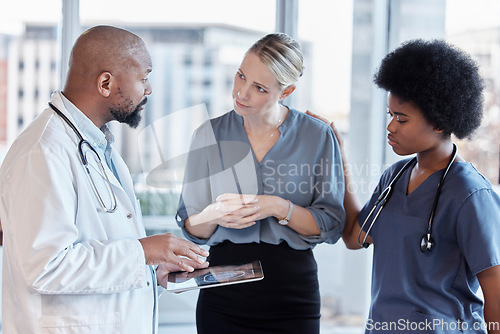 Image of Tablet, doctors and business woman planning, healthcare service and management, schedule and teamwork. Nurse, medical professional and people on digital technology for feedback or hospital data