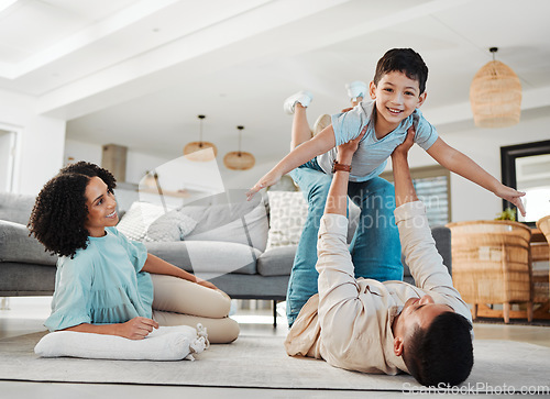 Image of Play, mother or father with a boy on floor relaxing as a happy family bonding in Australia with love or care. Portrait, airplane or parents smile with kid enjoying quality time on a fun holiday