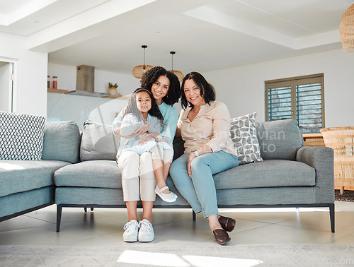 Image of Mom, grandmother and girl on sofa for portrait in living room, home or happy together for bonding, quality time in house. Smile, face of mother and elderly person to relax and support young child