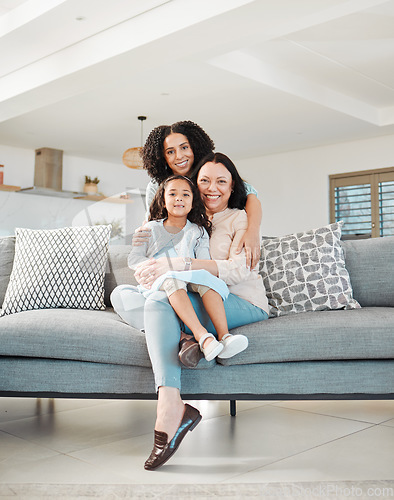 Image of Mother, grandmother and girl on sofa for portrait in living room, home or happy together for a hug or quality time in house. Smile, face of mama and elderly person relax with young child in embrace