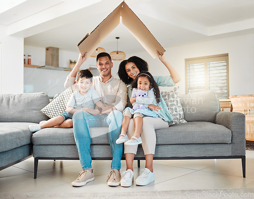 Image of Family, children and house portrait and insurance, investment on financial safety on sofa with mother and father. Parents, kids and interracial people with cardboard roof for home cover and security