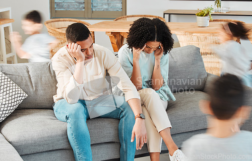 Image of Kids, running and tired parents on sofa with stress or chaos in living room, family home and children in house with energy. Exhausted, burnout and frustrated black couple on couch with young child