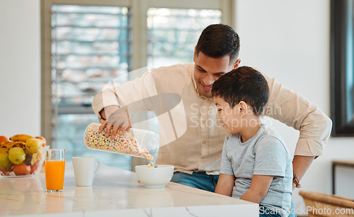 Image of Breakfast, morning and cereal with father and son at table for love, food and support. Happy, relax and health with man and child eating in family home for nutrition, helping and happiness together