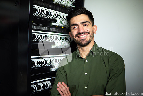 Image of Engineer man, cables and portrait in a server room for network, maintenance and software upgrade. Young male technician person with a smile in data center for wire, hardware and internet connection