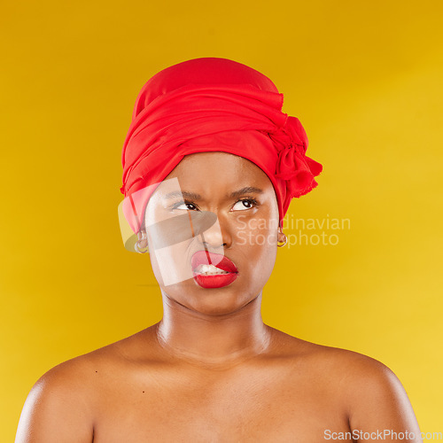 Image of Makeup, fail and face of black woman in studio angry with cosmetic or results on yellow background. Beauty, mistake and African female model frustrated with lipstick, color or treatment disaster