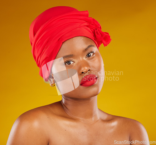 Image of Natural beauty, hair wrap and portrait with scarf, red lipstick and wellness in studio. Yellow background, female person and face cosmetics with African model and makeup for skincare and facial glow