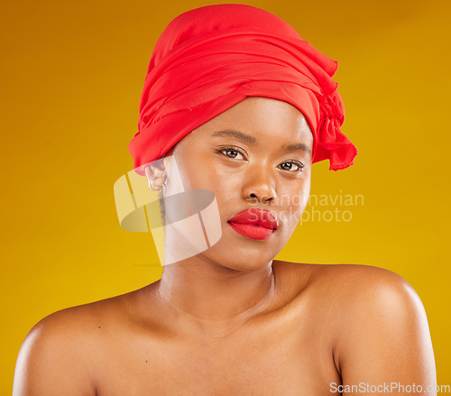 Image of Beauty, red wrap and woman portrait with scarf for self care and wellness in studio. Yellow background, female person and face cosmetics with African model and makeup for skincare and facial glow