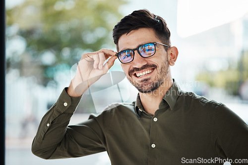 Image of Portrait, face of man and happy with glasses for vision, eyesight and prescription lens. Young male person smile with new frame for designer eyewear, optical fashion and assessment in eye care clinic